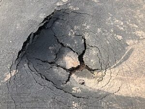 hole in asphalt